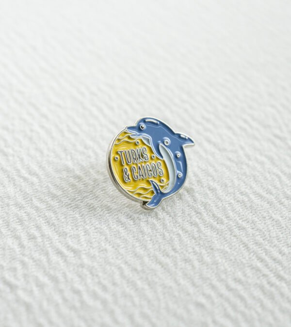 TCI blue dolphin enamel lapel pin