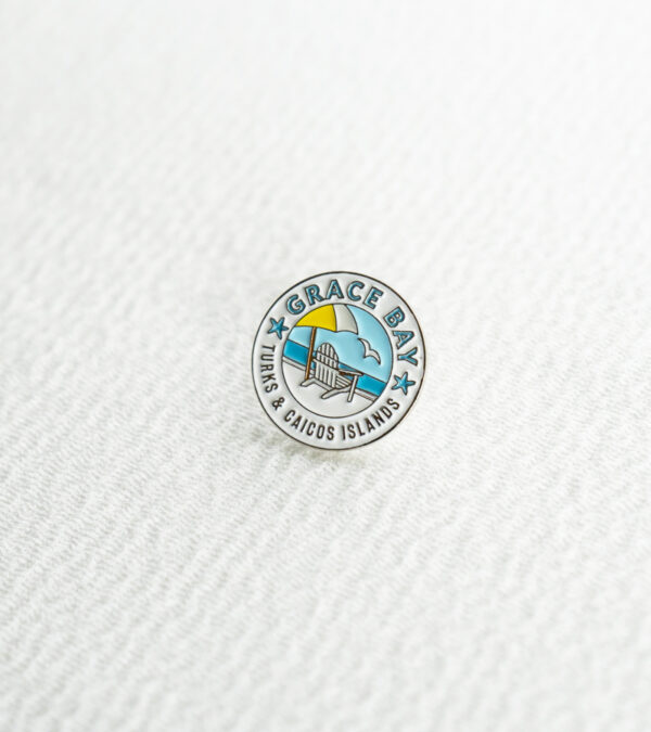 Grace Bay beach chair enamel lapel pin