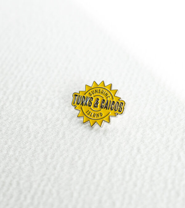 TCI sun enamel lapel pin