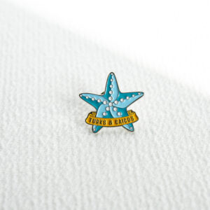 TCI blue starfish enamel lapel pin