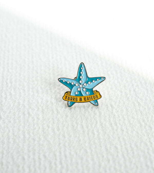 TCI blue starfish enamel lapel pin