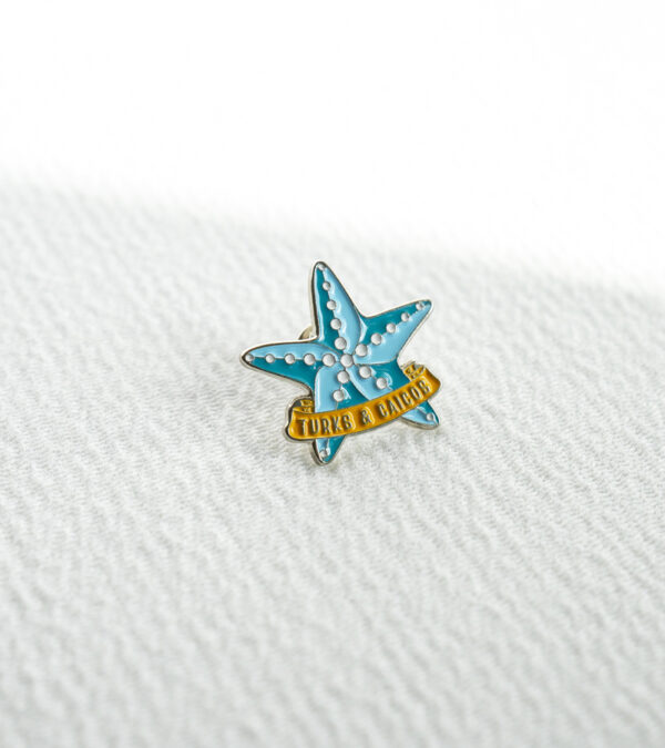 TCI blue starfish enamel lapel pin